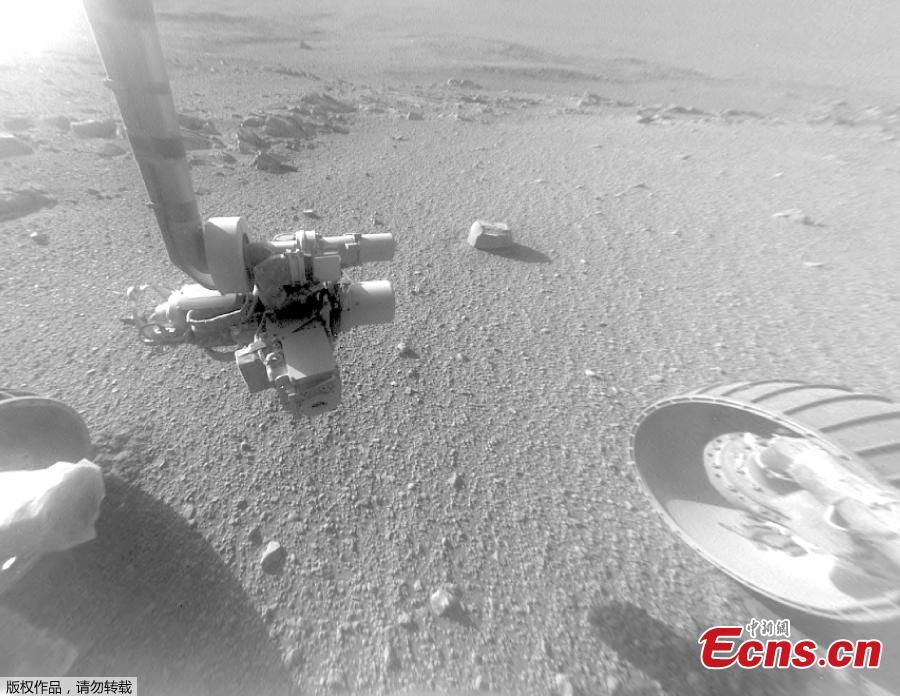 This Jan. 4, 2018 photo made available by NASA shows a view from the front Hazard Avoidance Camera of the Opportunity rover on the inboard slope of the western rim of Endeavour Crater on the planet Mars. A global dust storm prevented sunlight from reaching Opportunity’s solar panels, and the rover fell silent in June 2018. Although the skies have cleared considerably, Opportunity has yet to send word to flight controllers as of Tuesday, Sept. 25, 2018.  (Photo/Agencies)