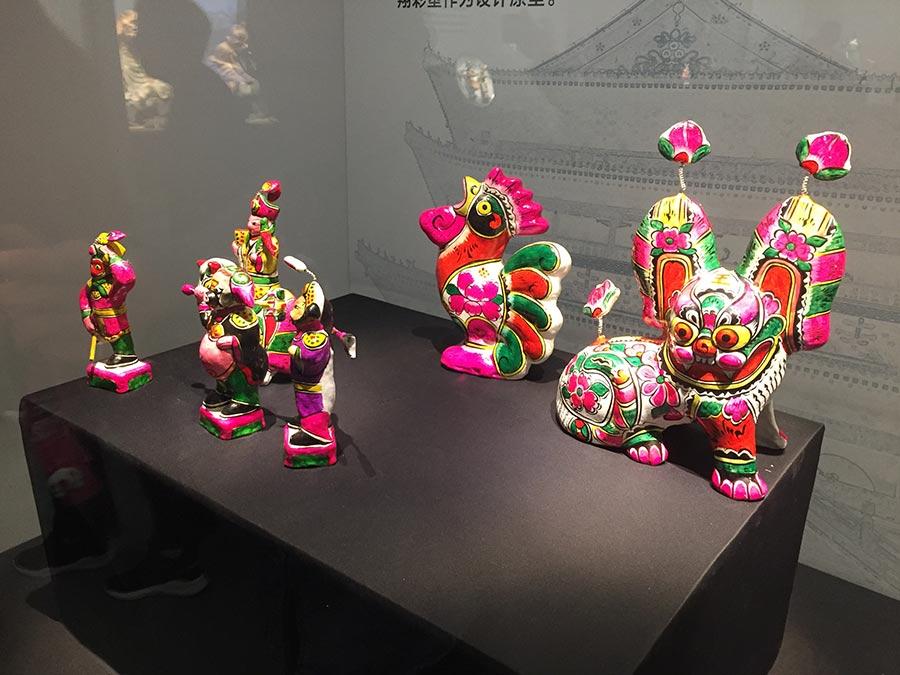 Colored sculptures are shown at the exhibition. (Photo/China Daily)