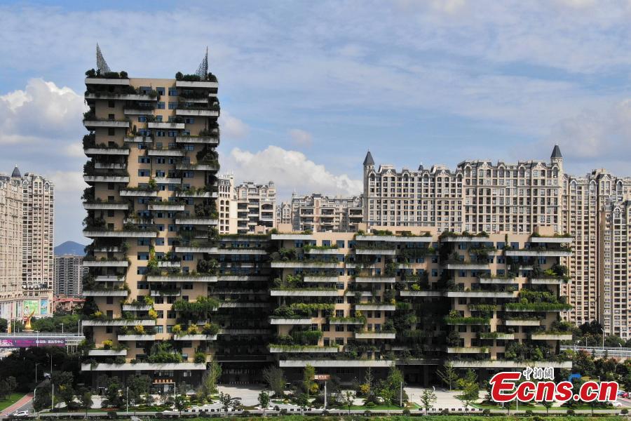 A drone photo shows a building covered with plants in Jurong City, East China’s Jiangsu Province, Sept. 26, 2018. The building looks like a vertical forest. (Photo: China News Service/Yang Bo)