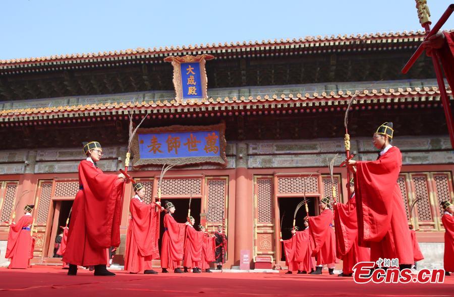 Participants wearing traditional costumes perform during a ritual to mark the 2,569th birthday of Confucius atthe Temple of Confucius in Beijing, Sept. 28, 2018. Confucius (551 BC-479 BC) was a great thinker, philosopher, and educator in ancient China. Confucius and his philosophy have profoundly influenced the Chinese politics, values and ethics. (Photo: China News Service/Bian Zhengfeng)