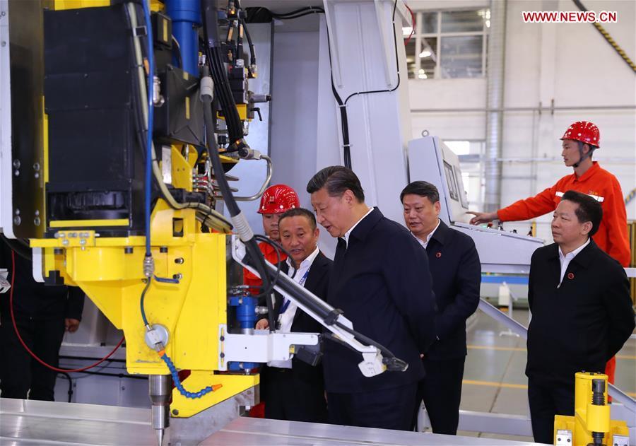 Chinese President Xi Jinping, also general secretary of the Communist Party of China (CPC) Central Committee and chairman of the Central Military Commission, visits a workshop of Liaoning-based China Zhongwang Holding in northeast China\'s Liaoning Province, Sept. 27, 2018. Xi started an inspection tour in Liaoning on Thursday. (Xinhua/Xie Huanchi)