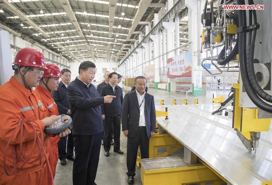 Chinese President Xi Jinping, also general secretary of the Communist Party of China (CPC) Central Committee and chairman of the Central Military Commission, visits a workshop of Liaoning-based China Zhongwang Holding in northeast China\'s Liaoning Province, Sept. 27, 2018. Xi started an inspection tour in Liaoning on Thursday. (Xinhua/Wang Ye)