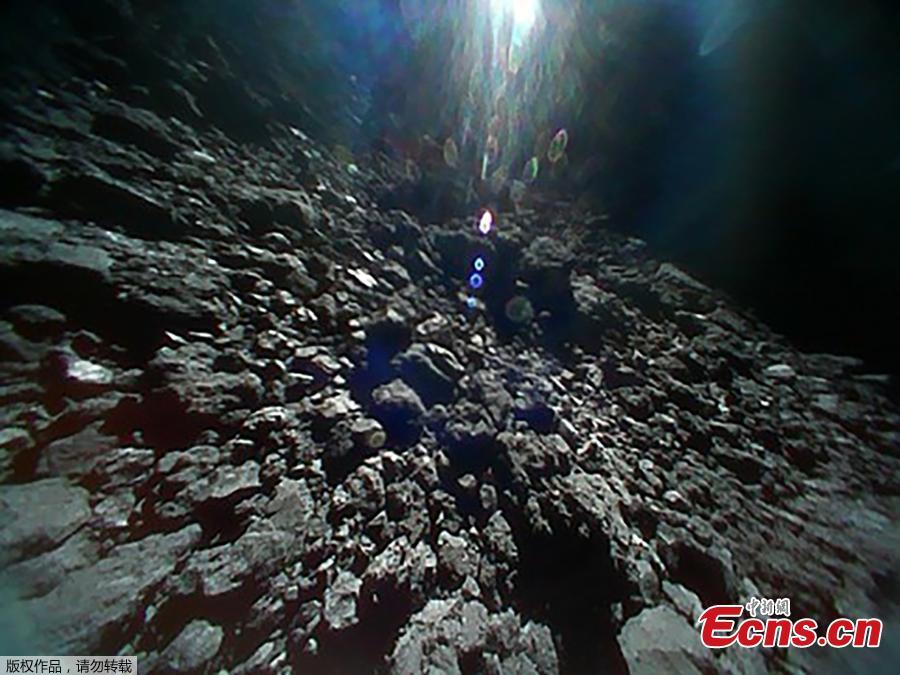 A handout photo made available by Japan Aerospace Exploration Agency (JAXA) shows an image of the surface of asteroid Ryugu, in space, Sept. 23, 2018, captured immediately before hop of Rover-1B. The MINERVA-II1 rovers, Rover-1A and Rover-1B, were deployed on Sept. 21 to explore the surface of asteroid Ryugu. (Photo/Agencies)