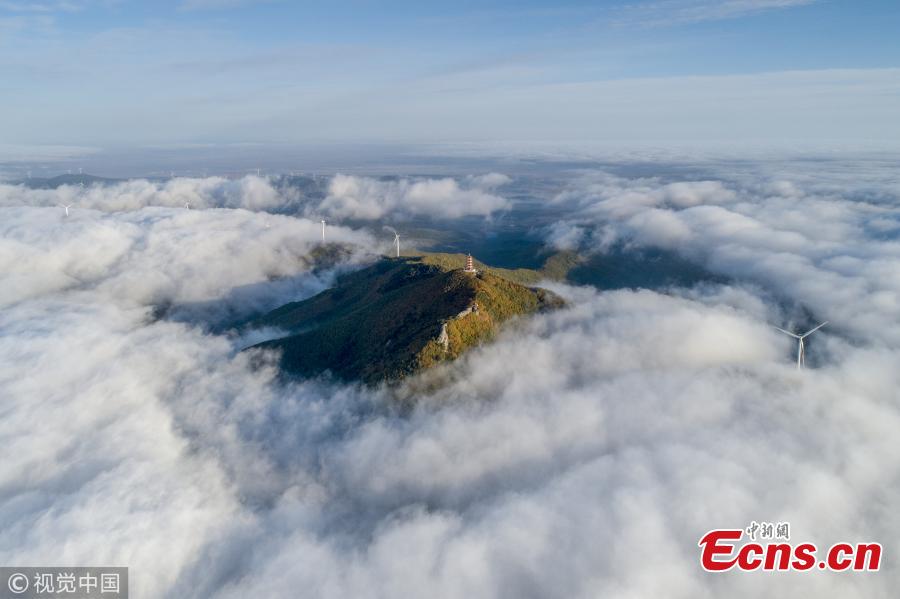 Photo taken on Sept. 29, 2018 shows the amazing natural landscape on Mifeng Mountain, or ‘bees mountain,’ north shore of the Xingkai Lake on the border between China and Russia, in Jixi City, Northeast China’s Heilongjiang Province. It’s the best time to visit the mountain, a national geopark with splendid autumn colors. (Photo/VCG)