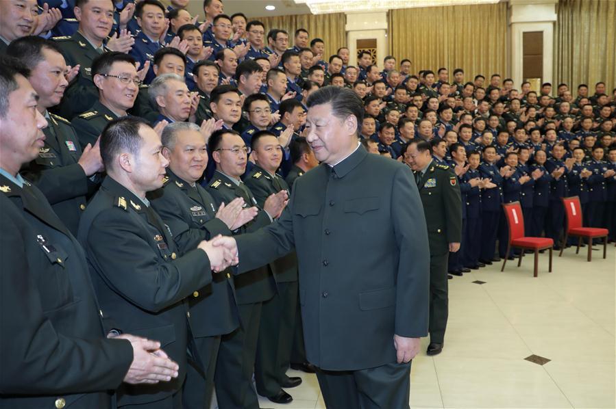 Chinese President Xi Jinping, also general secretary of the Communist Party of China (CPC) Central Committee and chairman of the Central Military Commission, meets with senior officers of troops stationed in northeast China\'s Liaoning Province, in Liaoning\'s capital city Shenyang, Sept. 28, 2018. Xi inspected the 79th Group Army of the People\'s Liberation Army and met with senior officers of troops stationed in Liaoning from Sept. 27 to 28. (Xinhua/Li Gang)