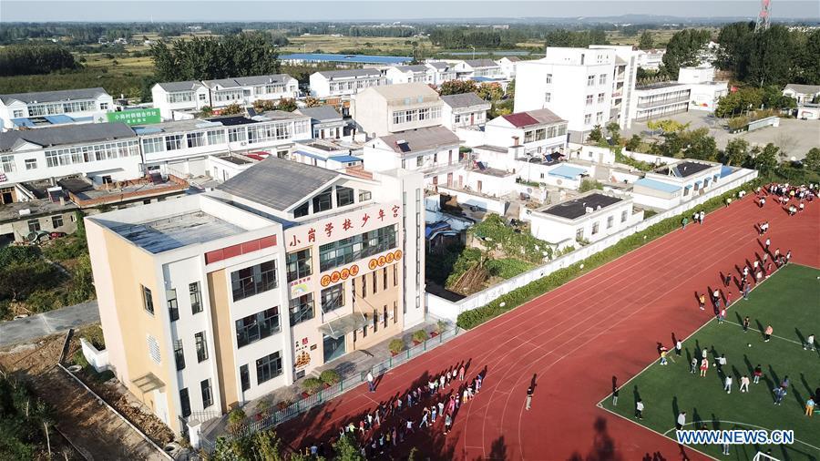 Aerial photo taken on Sept. 26, 2018 shows Xiaogang Primary School in Xiaogang Village of Fengyang County, east China\'s Anhui Province. Xiaogang, known as cradle of China\'s rural reform, witnessed great change in the past 40 years. (Xinhua/Zhang Duan)
