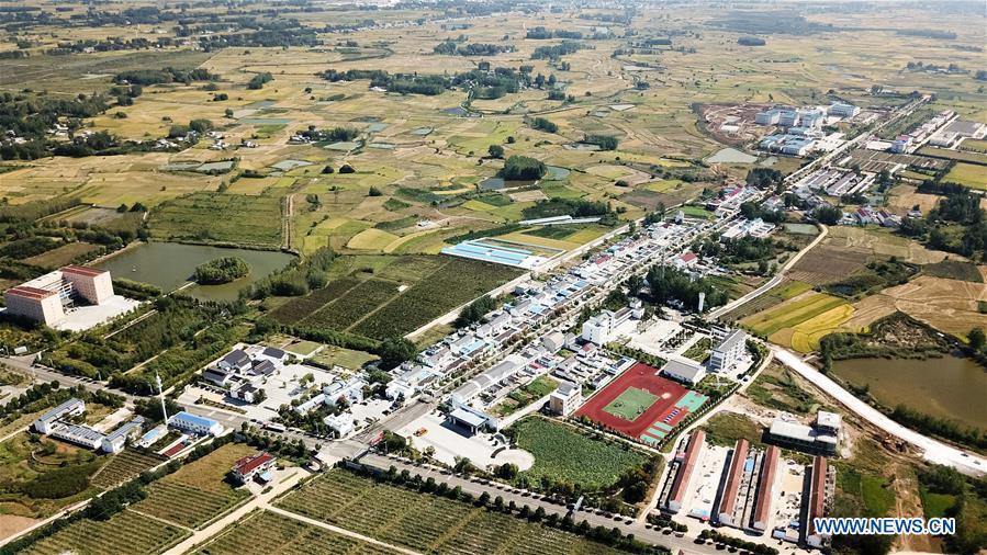 Aerial photo taken on Sept. 27, 2018 shows the view of Xiaogang Village in Fengyang County, east China\'s Anhui Province. Xiaogang, known as cradle of China\'s rural reform, witnessed great change in the past 40 years. (Xinhua/Zhang Duan)