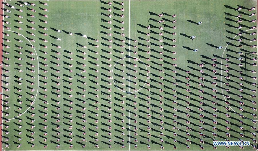 Aerial photo taken on Sept. 27, 2018 shows students doing exercise at Xiaogang Primary School in Xiaogang Village of Fengyang County, east China\'s Anhui Province. Xiaogang, known as cradle of China\'s rural reform, witnessed great change in the past 40 years. (Xinhua/Cai Yang)
