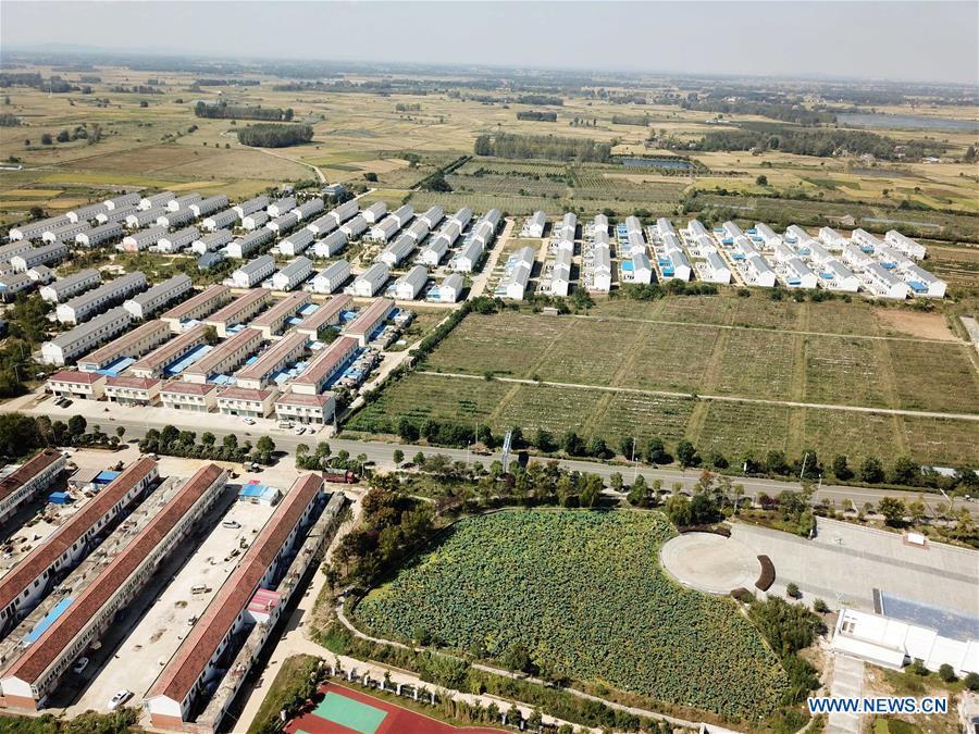 Aerial photo taken on Sept. 27, 2018 shows the view of Xiaogang Village in Fengyang County, east China\'s Anhui Province. Xiaogang, known as cradle of China\'s rural reform, witnessed great change in the past 40 years. (Xinhua/Liu Junxi)