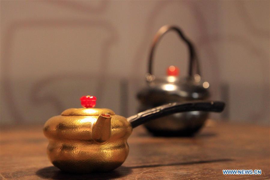 Photo taken on Oct. 4, 2018 shows the tea pots displayed at the Beijing Design Week in Beijing, capital of China. The Beijing Design Week, a platform aimed at promoting the concept of a sustainable development of creative and design industry, last from Sept. 22 to Oct. 7. (Xinhua/Sui Xiankai)