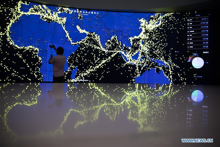 Photo taken on Aug. 12, 2018 shows a screen displaying real-time coordinates of global vessels in Shanghai, east China. Connecting 22 government departments, China (Shanghai) International Trade Single Window provides services covering one third of the total volume of China\'s import and export trade. At present, more than 270,000 enterprises have enjoyed the single-window services which enable them to complete administrative procedures for foreign trade. (Xinhua/Jin Liwang)