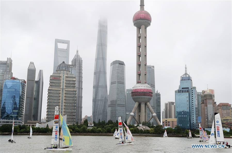 Sailboats are seen on the Huangpu River during activity marking the 2018 Maritime Day of China in east China\'s Shanghai, July 11, 2018. The 2018 Maritime Day of China was observed on July 11. (Xinhua/Fang Zhe)
As China International Import Expo (CIIE) is only a month away, Shanghai, host of the event, has reached the final stage of its preparations.
Now, let\'s have a glimpse on the different aspects of Shanghai, one of China\'s biggest cities -- from its busy economic life, vivid cultural scene and passionate sports contests to its blend of traditional and modern way of life.