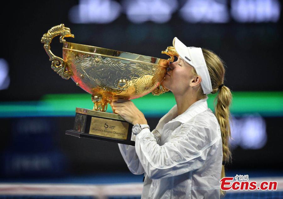 Caroline Wozniacki of Denmark celebrates with the trophy after winning the match against Anastasija Sevastova of Latvia at the final of women’s singles during the China Open in National Tennis Center, Beijing, China, October 7, 2018. (Photo: China News Service/Li Peirun)