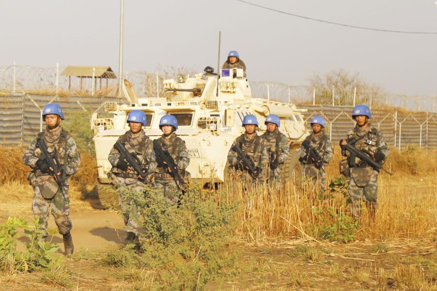 Chinese peacekeepers patrol in Juba, capital of South Sudan, to protect the population during the May Day holiday. (Photo/Xinhua)

The troops have also spent more than 100 days on duty outside Juba, covering over 50,000 kilometers in southern and central areas of the country. They have undertaken nine cordon-and-search operations and resolved 300 hostile incidents without violence within the weapon-free zone, including three in which armed insurgents penetrated the zone, intending to kidnap civilians.

\
