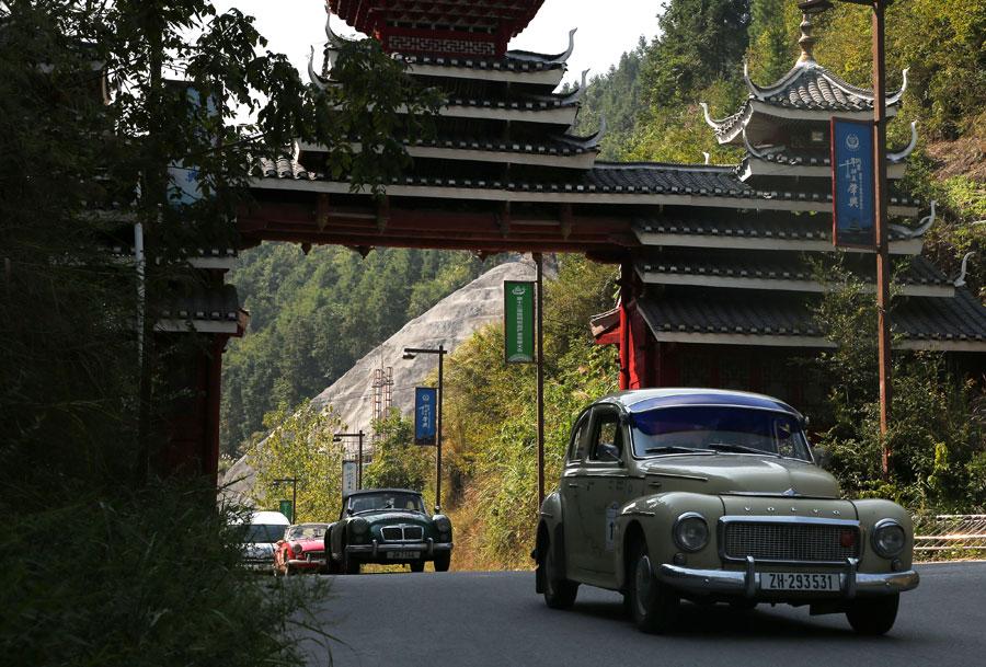 A group of 16 vintage cars arrived at a Dong ethnic village in Liping, Southwest China\'s Guizhou province on Oct. 8, 2018, after traveling through seven countries. (Photo provided to chinadaily.com.cn)