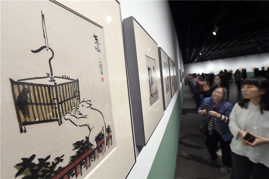 People view the exhibited items at Zhejiang Art Museum in Hangzhou, East China\'s Zhejiang Province, on Oct. 10, 2018. (Photo/Asianewsphoto)

Zhejiang Art Museum recently celebrated the 120th anniversary of Feng Zikai, a writer, painter, translator and music educator, who used to live in Hangzhou. The exhibition showcases 125 pieces of Feng\'s works together with 120 manuscripts. Visitors can also see 72 items created by the artist\'s teachers and students, getting a closer look at his life.