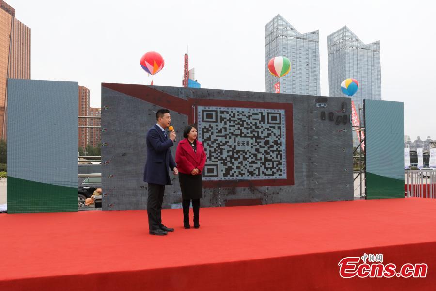 A QR code made by Donghe Agricultural Group using white and black rice has set a new Guinness World Record in Harbin, Northeast China’s Heilongjiang Province, Oct. 10, 2018. The image, 30 meters on each side, used five tons of black rice and five tons of white rice, making it the world\'s largest QR code made from grains. (Photo: China News Service/Yu Kun)