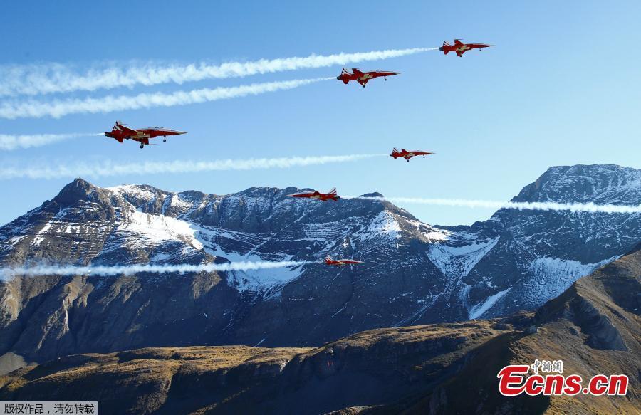 Members of the Patrouille Suisse perform the so-called \