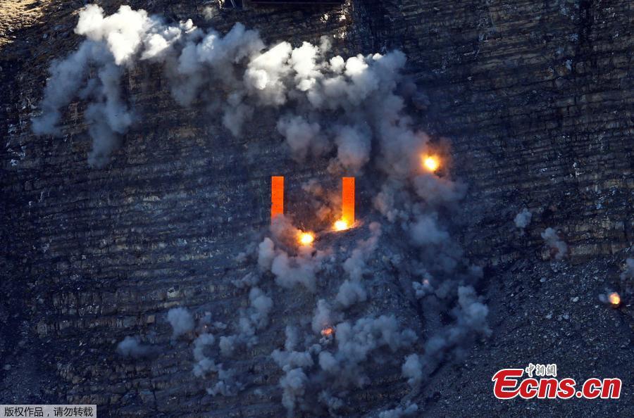 Ammunition shot by a Swiss Air Force fighter jet explodes on a target during a flight demonstration over the Axalp in the Bernese Oberland, Switzerland, Oct. 10, 2018. (Photo/Agencies)