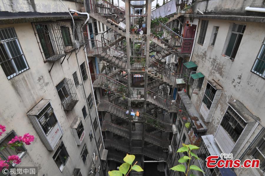 Two residential buildings share a stairwell in a community in Nanning City, South China’s Guangxi Zhuang Autonomous Region, Oct. 11, 2018. (Photo/VCG)