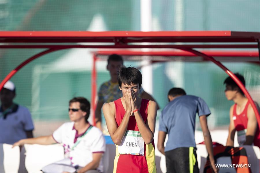 Chen Long of China reacts during the men\'s high jump of athletics event at the 2018 Summer Youth Olympic Games in Buenos Aires, Argentina, on October 14, 2018. Chen won the gold medal. (Xinhua/Li Ming)