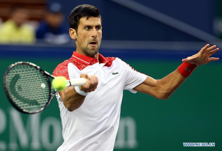 Novak Djokovic of Serbia celebrates after winning the men\'s singles final match against Borna Coric of Croatia at 2018 ATP Shanghai Masters tennis tournament in Shanghai, east China, Oct. 14, 2018. Novak Djokovic won 2-0 in the final and claimed the title of the event. (Xinhua/Fan Jun)