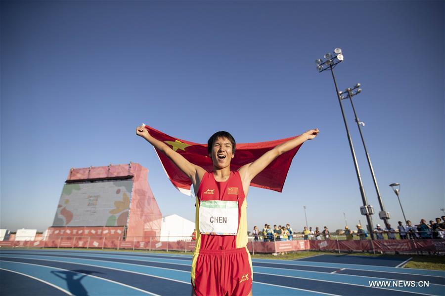 Chen Long of China celebrates after the men\'s high jump of athletics event at the 2018 Summer Youth Olympic Games in Buenos Aires, Argentina, on October 14, 2018. Chen won the gold medal. (Xinhua/Li Ming)