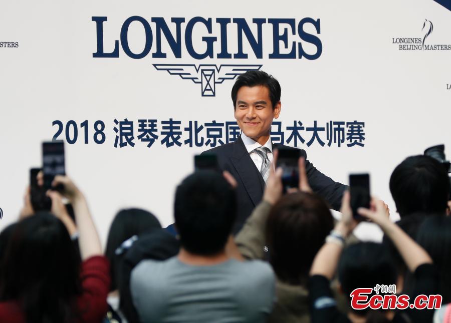 Eddie Peng Yu-yen, actor and singer, poses for a photo in the 8th Longines Equestrian Beijing Masters at the National Stadium in Beijing, Oct. 14, 2018. One of the grandest international equestrian events in China, it was jointly organized by Chinese Equestrian Association and the National Stadium. A total of 251 pairs of horses and riders joined the competition from Oct. 12 to 14, with the total prize money of 2.33 million yuan. (Photo: China News Service/Liu Guanguan)