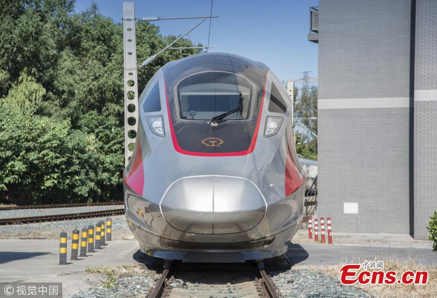 An extended version of the Fuxing bullet train at the China National Railway Test Center in Beijing. With a design speed of 350 kilometers per hour, the new train is 439.8 meters long with 17 carriages, which can carry 1,283 passengers. It will be put into use on the Beijing-Shanghai high-speed railway next year. (Photo/VCG)