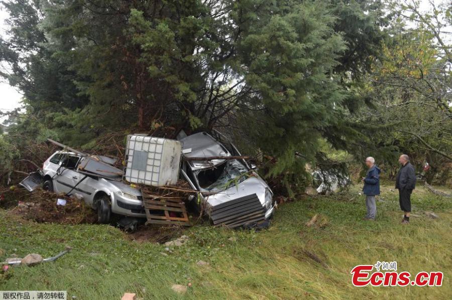Damaged cars are seen after some of the worst flash floods in a century turned rivers into raging torrents that engulfed homes and swept away cars hit the southwestern Aude district of France, in Conques, France, Oct. 16, 2018. At least 12 people died. (Photo/Agencies)