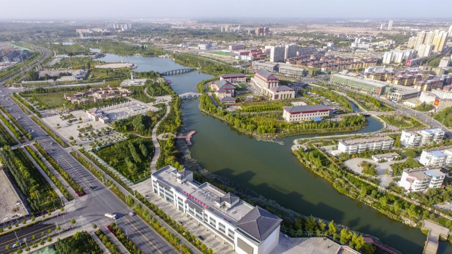 An aerial photo shows the second phase of the Duolang River improvement project in Aksu, Northwest China\'s Xinjiang Uyghur autonomous region, Sept 21, 2018. (Photo/Xinhua)