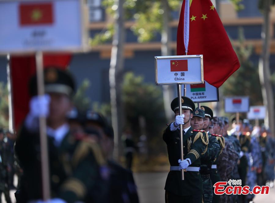 An international sniping competition opens on the outskirts of Beijing on October 18, 2018. Hosted by Chinese armed police forces, the competition invited contestants from member states of the Shanghai Cooperation Organization (SCO) and countries along the Belt and Road. The competition consists of 12 major events including close-range sniping, hostage rescue and comprehensive combat. This is the second such competition hosted by Chinese armed police forces. The first was held in 2016. (Photo: China News Service/ Song Jihe)