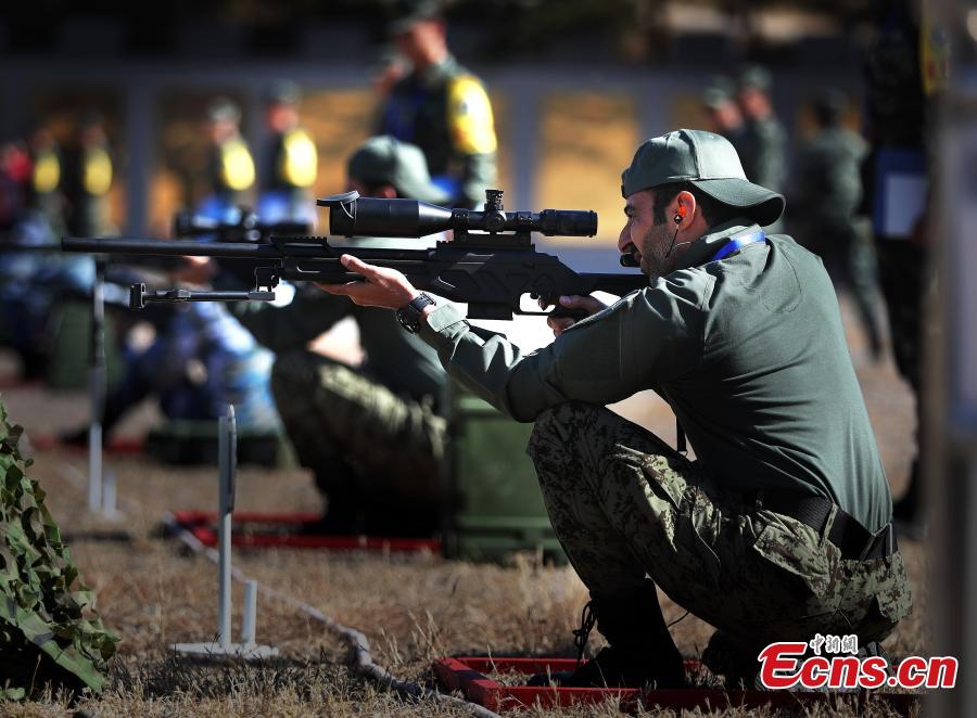 An international sniping competition opens on the outskirts of Beijing on October 18, 2018. Hosted by Chinese armed police forces, the competition invited contestants from member states of the Shanghai Cooperation Organization (SCO) and countries along the Belt and Road. The competition consists of 12 major events including close-range sniping, hostage rescue and comprehensive combat. This is the second such competition hosted by Chinese armed police forces. The first was held in 2016. (Photo: China News Service/ Song Jihe)