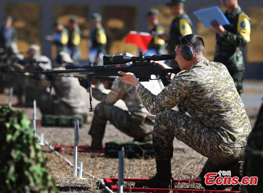 An international sniping competition opens on the outskirts of Beijing on October 18, 2018. Hosted by Chinese armed police forces, the competition invited contestants from member states of the Shanghai Cooperation Organization (SCO) and countries along the Belt and Road. The competition consists of 12 major events including close-range sniping, hostage rescue and comprehensive combat. This is the second such competition hosted by Chinese armed police forces. The first was held in 2016. (Photo: China News Service/ Song Jihe)