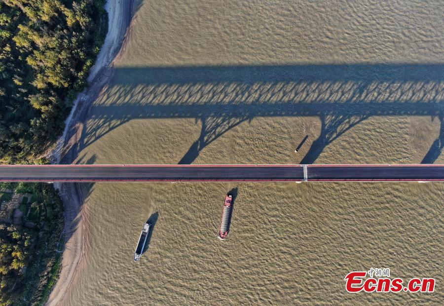 A drone photo shows the Nanjing Yangtze River Bridge, which is undergoing renovation work, in Nanjing City, Jiangsu Province, Oct. 18, 2018. A double-decked road-rail truss bridge across the Yangtze River, it was completed and open for traffic in 1968 and remains one of the most famous landmarks in China. The bridge is set to reopen by the end of the year. (Photo: China News Service/Yang Bo)