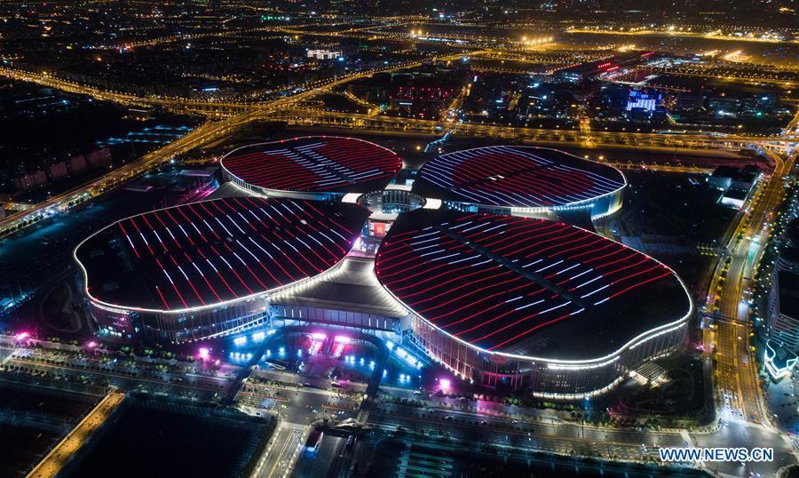 Photo taken on Oct. 21, 2018 shows a night view of the National Exhibition and Convention Center (Shanghai) in Shanghai, east China. The six-day China International Import Expo (CIIE) will be opened in the center on Nov. 5. (Xinhua/Ding Ting)