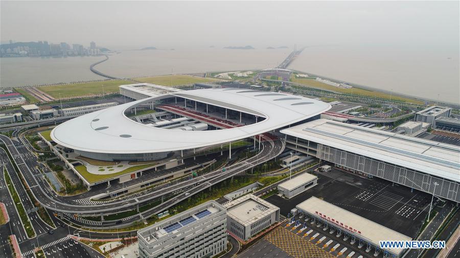 Aerial photo shows the Zhuhai Port of Hong Kong-Zhuhai-Macao Bridge in Zhuhai, south China\'s Guangdong Province, Oct. 11, 2018. Customs clearance between Macao and Zhuhai will be carried out on a \