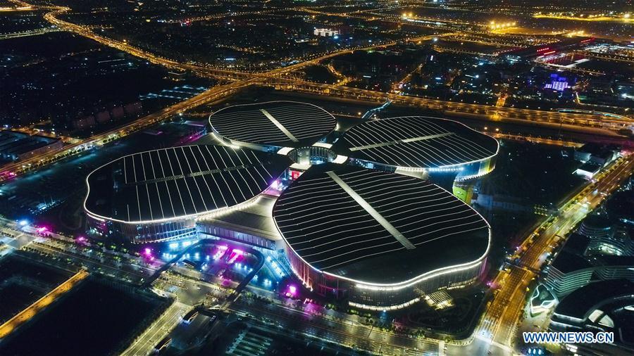 Photo taken on Oct. 21, 2018 shows a night view of the National Exhibition and Convention Center (Shanghai) in Shanghai, east China. The six-day China International Import Expo (CIIE) will be opened in the center on Nov. 5. (Xinhua/Ding Ting)