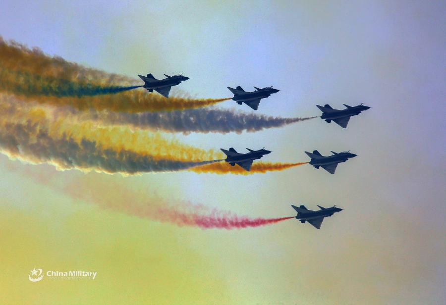 Six J-10 fighter jets attached to the August 1st Aerobatics Team of the Chinese People\'s Liberation Army (PLA) Air Force execute aerobatic maneuvers during the aviation open day at an airport in North China on October 20, 2018. (Photo/eng.chinamil.com.cn)