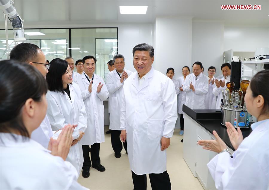 Chinese President Xi Jinping, also general secretary of the Communist Party of China Central Committee and chairman of the Central Military Commission, visits the Traditional Chinese Medicine Science and Technology Industrial Park of Co-operation between Guangdong and Macao in Zhuhai, south China\'s Guangdong Province, Oct. 22, 2018. Xi made an inspection tour in Zhuhai on Monday. (Xinhua/Xie Huanchi)