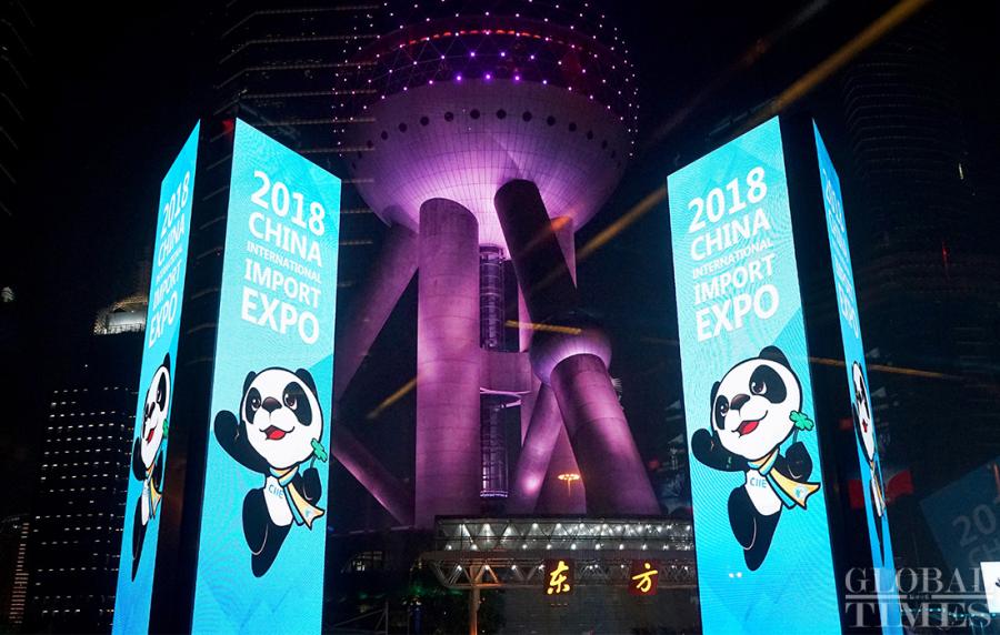 Signs showcasing the CIIE mascot are placed in front of Shanghai\'s landmark Lujiazui Oriental Pearl TV Tower.  (Photo: Yang Hui/GT)