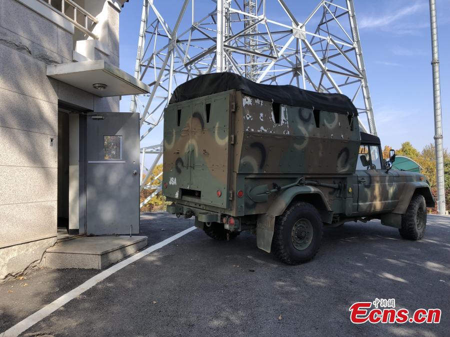 In this photo provided by South Korea Defense Ministry, a military vehicle waits to carry military equipment before leaving from the border village of Panmunjom, South Korea, Oct. 25, 2018. Koreas completed withdrawing firearms and troops from a jointly controlled area at the Koreas\' border village on Thursday as part of their sweeping agreements to reduce decades-long military animosities on the Korean Peninsula. (Photo/Agencies)