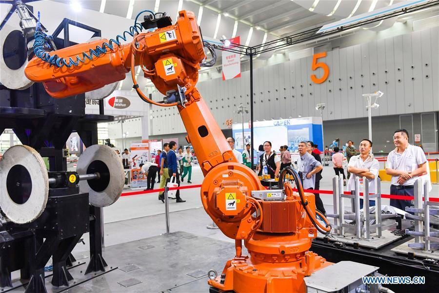 A robot is displayed at the Internet Plus Expo in Shunde District of Foshan, south China\'s Guangdong Province, Oct. 25, 2018. Themed with \