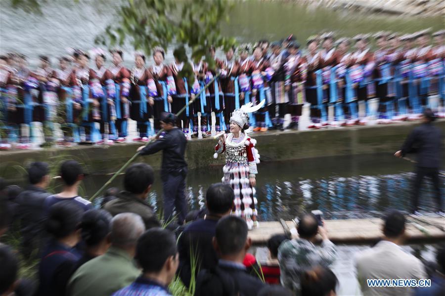 A singer of Miao ethnic group sings during a harvest festival in Dongtou Village, Rongshui Miao Autonomous County, south China\'s Guangxi Zhuang Autonomous Region, Oct. 26, 2018. Local people celebrated harvest Friday through various activities like fish feast, singing and playing lusheng. (Xinhua/Lan Hongguang)