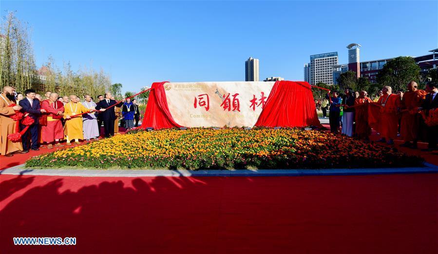 Guests for the fifth World Buddhist Forum attend an inauguration ceremony for a memorial at Nanhu Park in Putian, southeast China\'s Fujian Province, Oct. 28, 2018. A record number of over 1,000 Buddhists, scholars and representatives from 55 countries and regions attended the fifth World Buddhist Forum, which will last until Oct. 30.(Xinhua/Wei Peiquan)