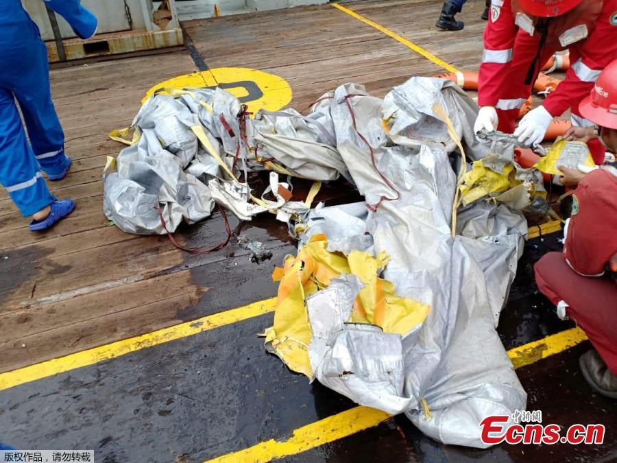 Workers of PT Pertamina examine recovered debris of what is believed from the crashed Lion Air flight JT610, onboard Prabu ship owned by PT Pertamina, off the shore of Karawang regency, West Java province, Indonesia, Oct. 29, 2018. An aircraft with 188 people on board is believed to have sunk after crashing into the sea off Indonesia’s island of Java on Monday, shortly after takeoff from the capital on its way to the country’s tin-mining hub, officials said. (Photo/Agencies)