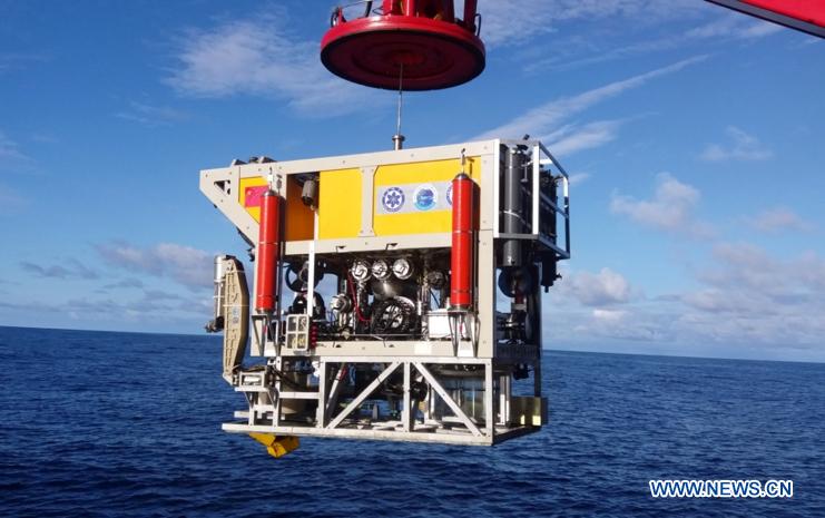 Photo taken on Oct. 16, 2018 shows Haixing 6000, one of China\'s underwater robots, ready for diving during a research expedition. Haixing 6000 set a national depth record for a Chinese remotely operated vehicle, by diving 6,001 meters below sea surface during its first research expedition, scientists told Xinhua Sunday. Haixing 6000 was developed by a team at the Shenyang Institute of Automation under the Chinese Academy of Sciences. It is the first remotely operated underwater vehicle built by China that is capable of diving 6,000 meters, said Li Zhigang, chief scientist of the team. It reached a maximum depth of 6,001 meters, and completed a series of underwater tasks in three hours, including deep-sea observation, biological research, soil and water sample collection, and a simulative black box search. (Xinhua)