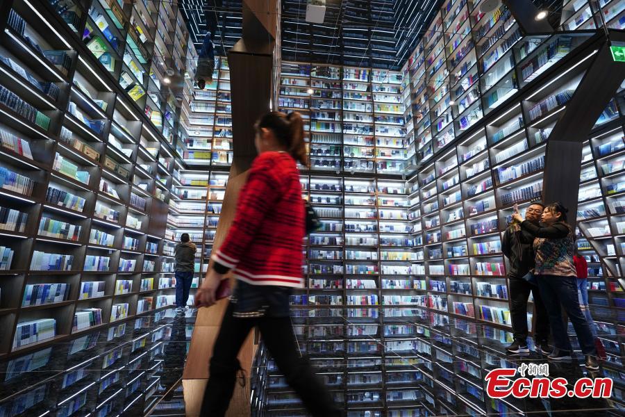 Neatly-arranged books are set on shelves at a new outlet of the Zhongshuge bookstore in Guiyang City, Southwest China’s Guizhou Province, Oct. 29, 2018. The design of the store took inspiration from the karst landforms of the province and features other signature tourism and cultural icons, making it a fresh attraction for local readers and other visitors. (Photo: China News Service/He Junyi)