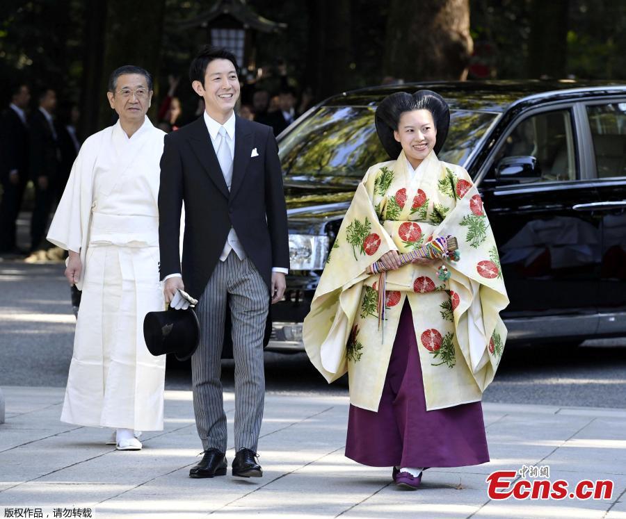 Photo taken on Oct. 29, 2018 shows Japan\'s Princess Ayako married a commoner at Meiji Shrine in Tokyo, Japan. The wedding ceremony included an exchange of rings and a sharing of a cup of sake, according to Japanese media. Ayako, 28, is the daughter of the emperor\'s cousin, and Moriya, 32, works for major shipping company Nippon Yusen. (Photo/Agencies)