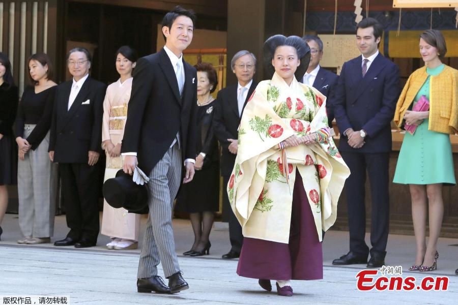 Photo taken on Oct. 29, 2018 shows Japan\'s Princess Ayako married a commoner at Meiji Shrine in Tokyo, Japan. The wedding ceremony included an exchange of rings and a sharing of a cup of sake, according to Japanese media. Ayako, 28, is the daughter of the emperor\'s cousin, and Moriya, 32, works for major shipping company Nippon Yusen. (Photo/Agencies)